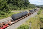 UTLX 203384 on a flat car